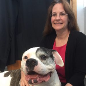 Photo of Kathy Gilman and her dog, Gloria